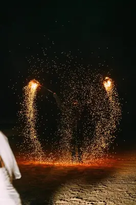 a fire show in the street at night at Long Beach Club Krabi in Ban Nong Thale