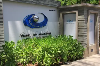 a building with a sign that reads rent of vibration at Pearl of naithon two 2 bedrooms in Nai Thon Beach