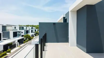an open door on the balcony of a building at Laguna Park Villa in Phuket Town
