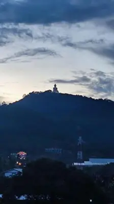 a view of a hill with a building on top of it at 1bed in Chalong