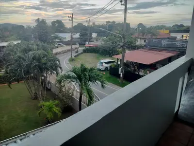 a view of a street from the balcony of a building at the three pyramids in Phuket Town
