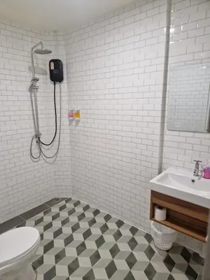 a bathroom with a shower and a toilet and a sink at Bonanza Patong Beach1 100m to Beach Moon Room in Patong Beach
