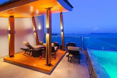 a villa with a swimming pool on the roof at EVA Beach sea view Four room villa in Ban Saiyuan (1)