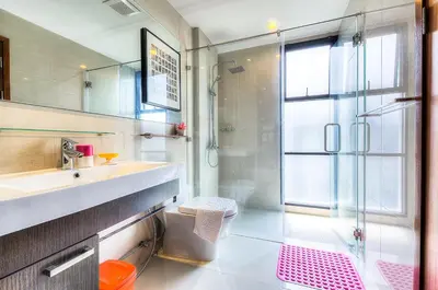 a bathroom with a sink and a shower at The Title Boutique Phuket in Rawai Beach