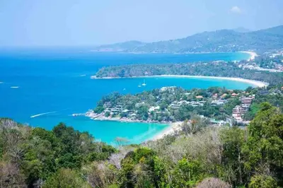 an island in the middle of a body of water at Charming Pool Twin Holiday Home in Patong Beach
