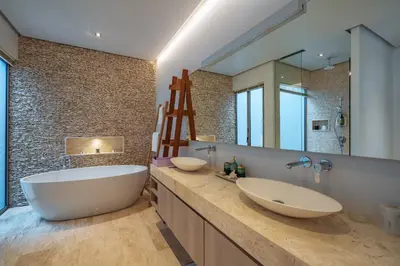 a bathroom with two sinks and a large mirror at 3BR Villa with Pool at Anchan Hills in Bangtao in Bang Tao Beach