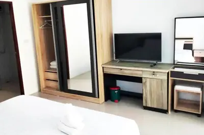 a living room with a television and a mirror at 3 Bedrooms Pool Villa in Kamala in Kamala Beach