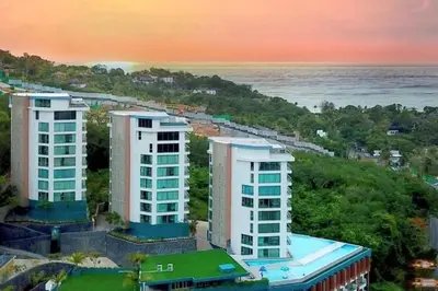 an aerial view of two tall buildings next to the ocean at Great value! Convenient studio near Kamala beach in Kamala Beach