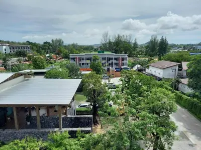 an aerial view of a city with a building at A3 Руб ВАТСАП669З582I976 in Phuket Town