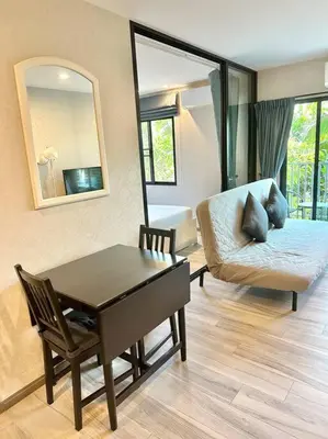a living room with a table and a couch and a mirror at G15 ВАТСАП669З5В2I976 оплата РУБЛИ in Nai Yang Beach