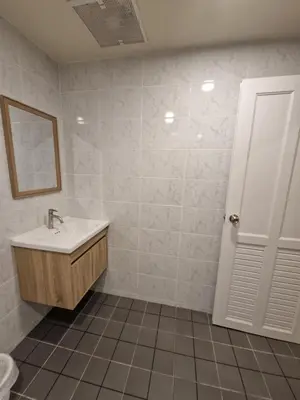 a bathroom with a sink and a mirror at Bonanza Patong Beach1 100m to Beach Star Room in Patong Beach