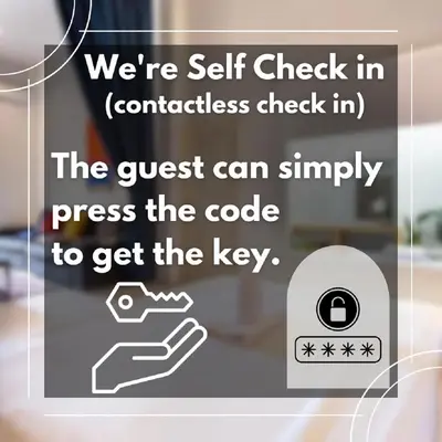 a sign that says were self check in contactless check in at XX GO INN Aonang Beach โกอินน์ หาดอ่าวนาง in Ban Khlong Haeng