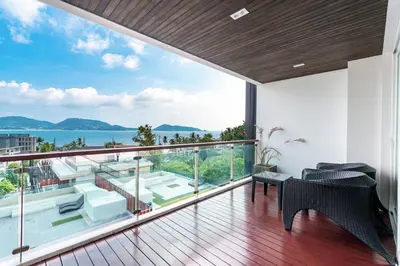 a balcony with a view of the ocean at Patong Kalim Unparalleled Sea View B&B Resort in Patong Beach