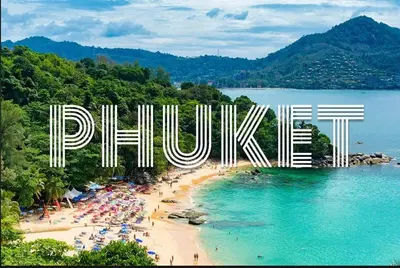 a large sign that says philippines on a beach at Patong Vacation Condos by Pam - 28 SQM modern condos with private bathroom, kitchen, King Bed, free WiFi and 65 inch smart TC in Patong Beach