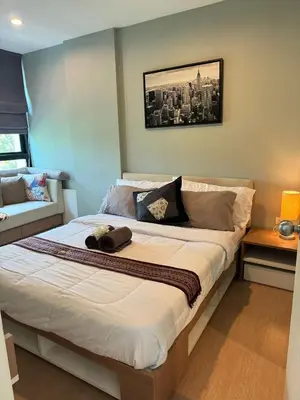 a large bed in a room with at Zcape X2 boat avenue by sahana in Bang Tao Beach