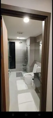 a bathroom with a toilet and a sink at Rawai The Title V 1BR in Rawai Beach