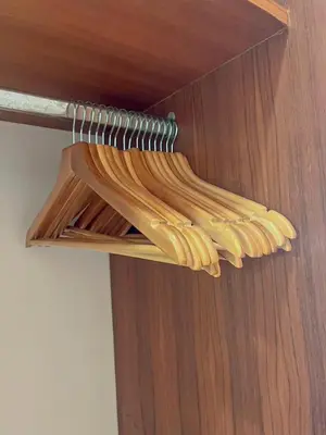 a bunch of spaghetti hanging from a wooden door at VK House Rawai, Phuket in Rawai Beach