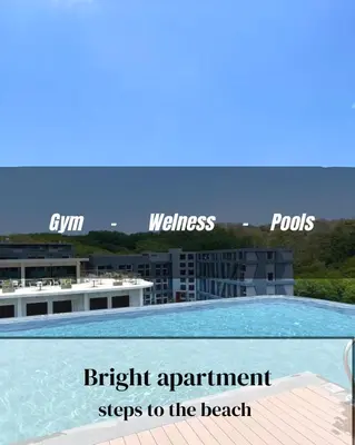 a sign that says flight appointment steps to the beach and a swimming pool at Utopia Naiharn by Fred&Com Phuket in Rawai Beach