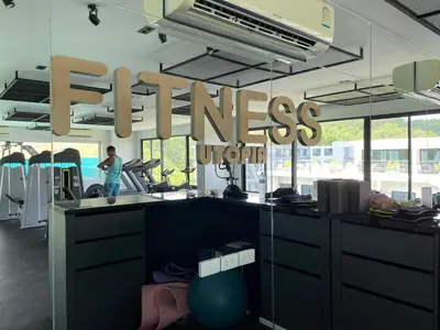 a gym with a sign that reads fitness turnover at Utopia Naiharn by Fred&Com Phuket in Rawai Beach