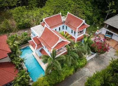 an aerial view of a house with a swimming pool at Mountain View Villa Kamala in Kamala Beach