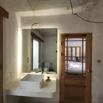 a bathroom with a sink and a mirror at The Hip House Villa Phuket in Ban Bang Khu