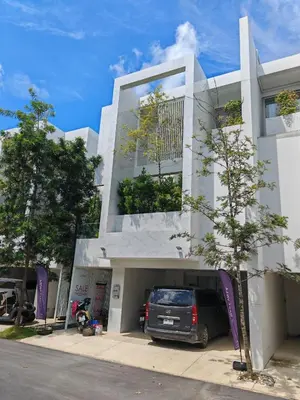 a van parked in front of a white building at Andaman Villa 15 minutes from Bangtao Beach in Phuket Town