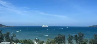 a view of a large body of water with boats at Patong tower 2bedroom 2 bathrooms, corner view in Patong Beach