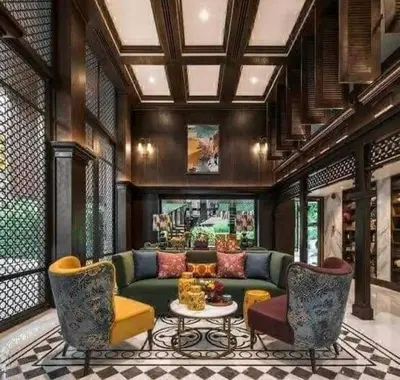 a living room with a green couch and chairs at THE BASE CENTRAL Phuket Shopping Mall Central Floresta in Ban Rangeng