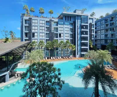 an overhead view of a large apartment building with a swimming pool at Citygate Kamala Resort & Residence in Kamala Beach