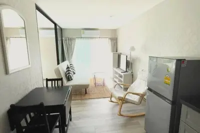a kitchen and living room with a refrigerator and a table at B4 БАССЕЙН ВаТСАП669З582I976 in Nai Yang Beach