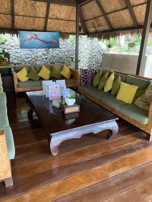 a living room with a couch and a coffee table at Sea View One Bedroom Condo in Kata Beach in Kata Beach