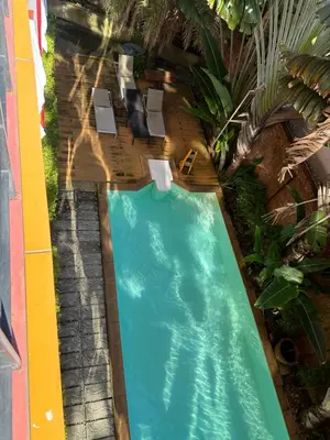 an overhead view of a swimming pool in a backyard at Nai Harn Beach Condo (C2) in Rawai Beach