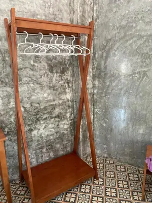 a wooden shelf in a room with a wall at Green Tree Cottage3 in Klong Muang Beach