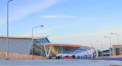 a large soccer stadium with a large building at OYO 1075 The View at Naiyang in Nai Yang Beach