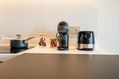 a coffee maker on a counter in a kitchen at Laguna Lakeside apartments with panoramic view in Bang Tao Beach
