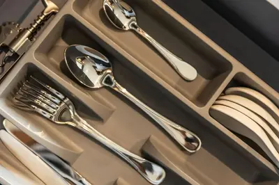 a tray with silver utensils sitting on a table at Best Facilities Fully Loaded Nicest Apartment c138 in Kamala Beach