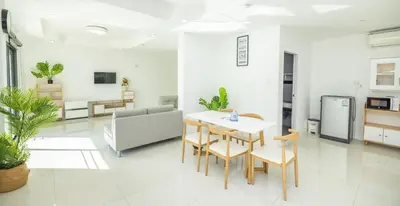 a dining room with a table and chairs at The coconut nanai resort in Patong Beach