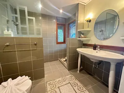 a bathroom with a sink and a shower at Villa Moon Talay View in Patong Beach