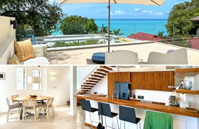 a kitchen and dining room with a view of the ocean at At the Beach Spacious 2-level Design Home for 2-5 and 1 infant, Ao Yon Beach Phuket in Ban Ao Makham