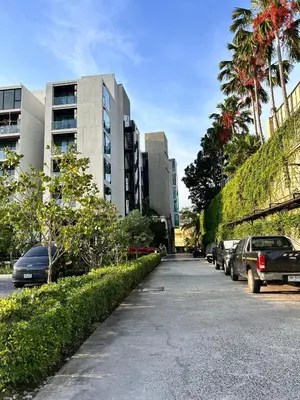 a street with cars parked on the side of a building at The Viva Patong Condo - 1Bdr - 35sqm Studio - Patong Hills in Patong Beach