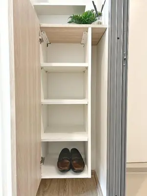 a closet with a pair of shoes in it at PHYLL Condo Private Beach Vibes at Central Phuket 1 BR Unique Garden View in Ban Rangeng