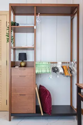 a cupboard with a desk in a room at Chalong V pool villa in Ban Klang