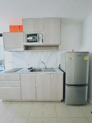 a kitchen with a sink and a refrigerator at 04near Shopping Malls and Naka night market in Phuket Town