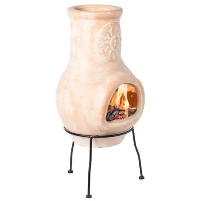 a vase with a fire inside of it at Phuket in Chalong