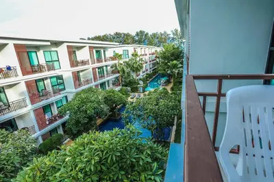 an aerial view of an apartment complex with a resort at C251 Beachfront gym Sauna 7 Swimming Pool in Rawai Beach