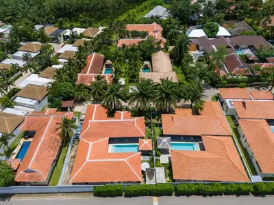 an aerial view of a group of houses at Luxury 4 Bedrooms 800 square meters of large space Private swimming pool private kitchen service Family and friends vacation in Bang Tao Beach
