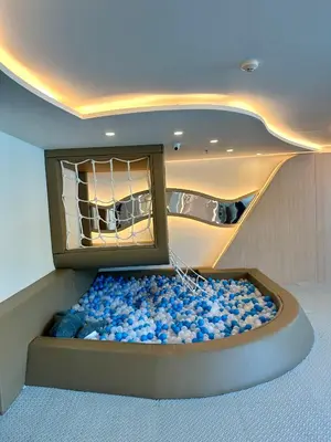a room with a tub filled with blue rocks at Duplex Luxury Apartments in 5 Star Hotel in Rawai Beach