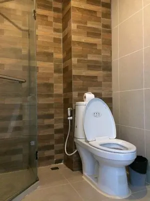 a bathroom with a toilet and a shower at xx GO INN Ao Nang Krabi - โกอินน์ อ่าวนาง กระบี่ Aonang in Ban Khlong Haeng