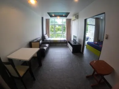 a living room with a couch and a table at At Seacondo-1 Bedroom-A07 in Haad Klong Son