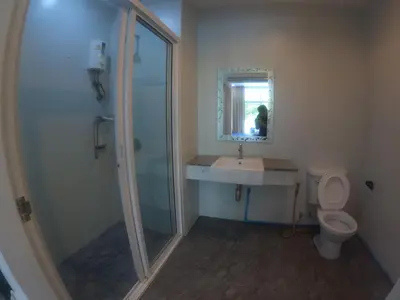 a bathroom with a shower and a sink and a toilet at At Seacondo-1 Bedroom-A07 in Haad Klong Son